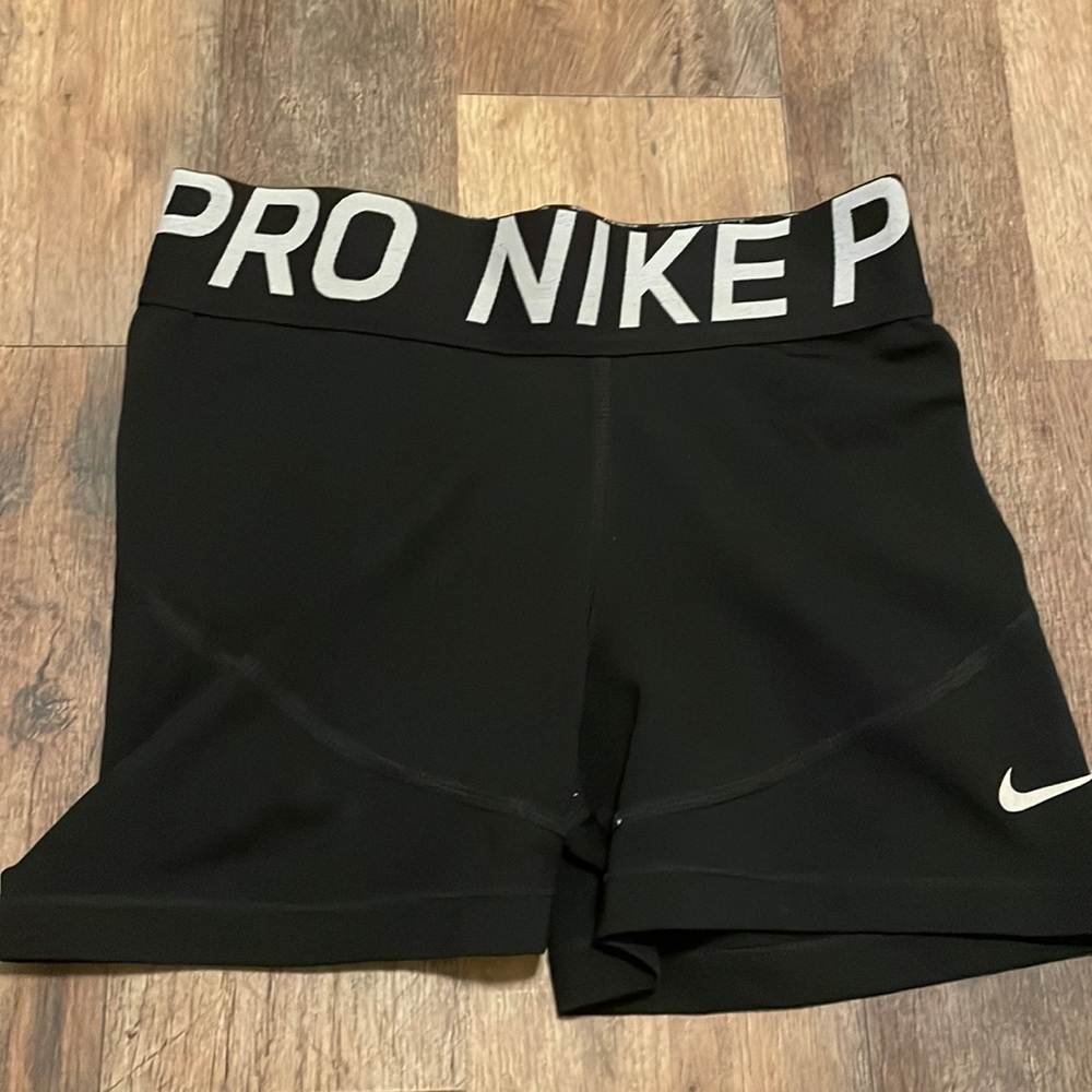Xs Nike pros! Black with white details.